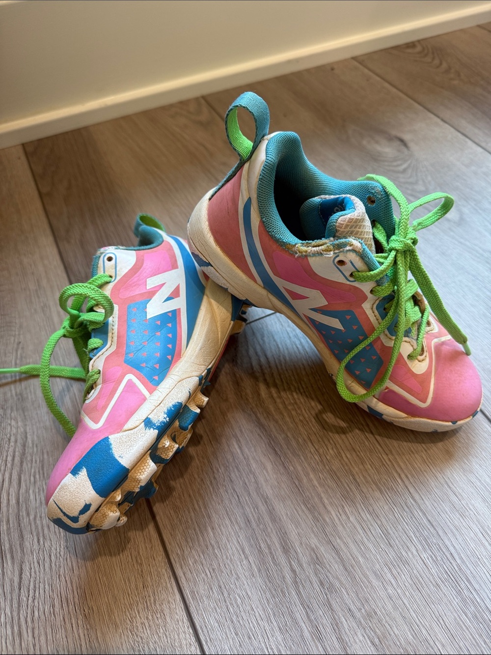 Kids Pink & Blue softball cleats with I Green Laces new balance